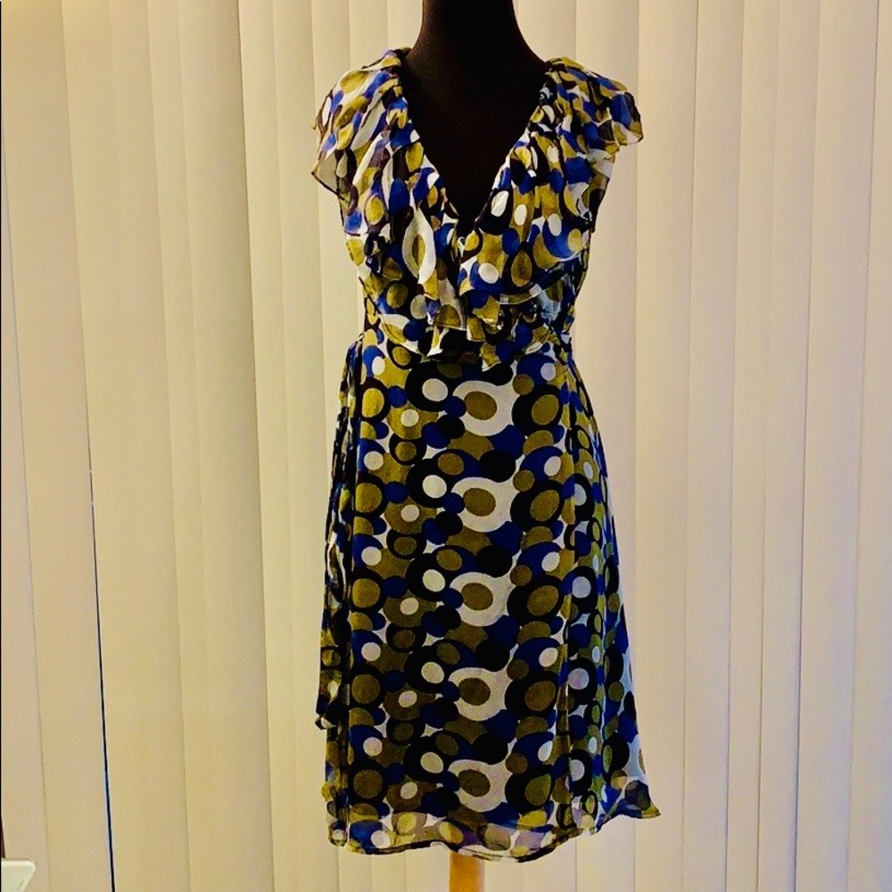 Vintage Sugar Lips Atelier sleeveless wrap around ruffle dress.